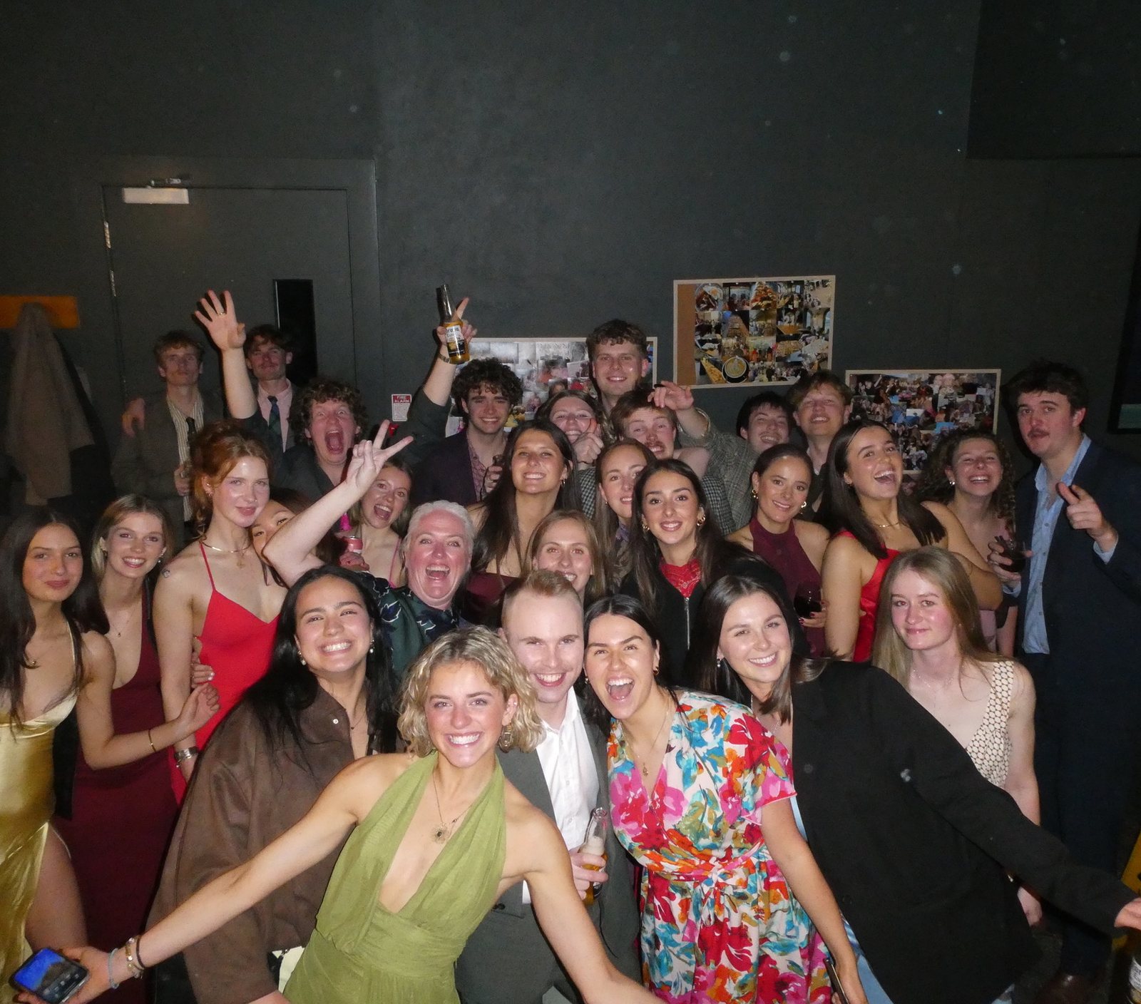 A big group dressed up for an end-of-year celebration