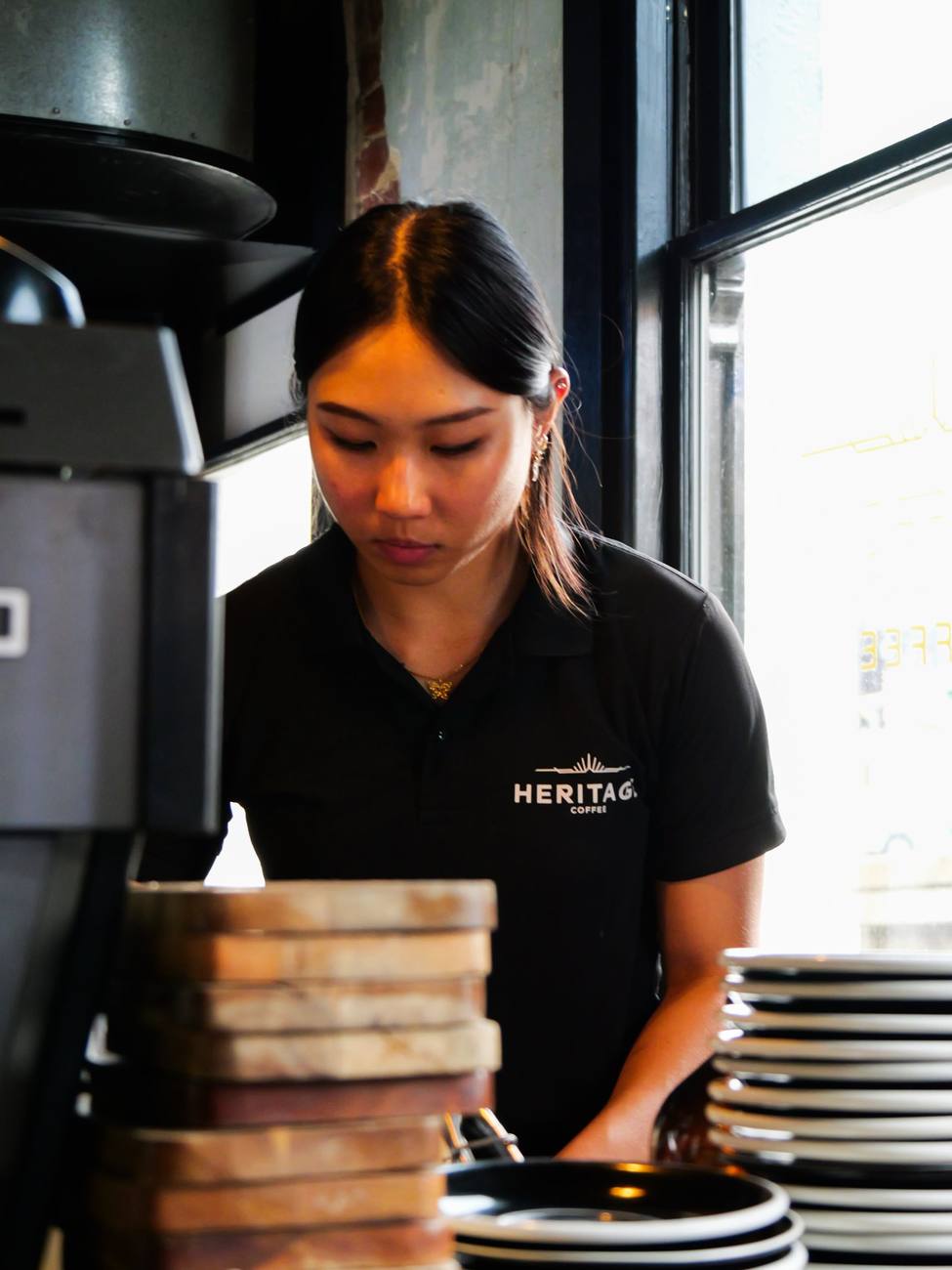 One of the team at work behind the counter
